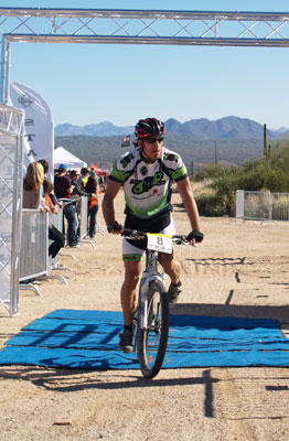 bicycle world tv rider tom cooley finishing second.